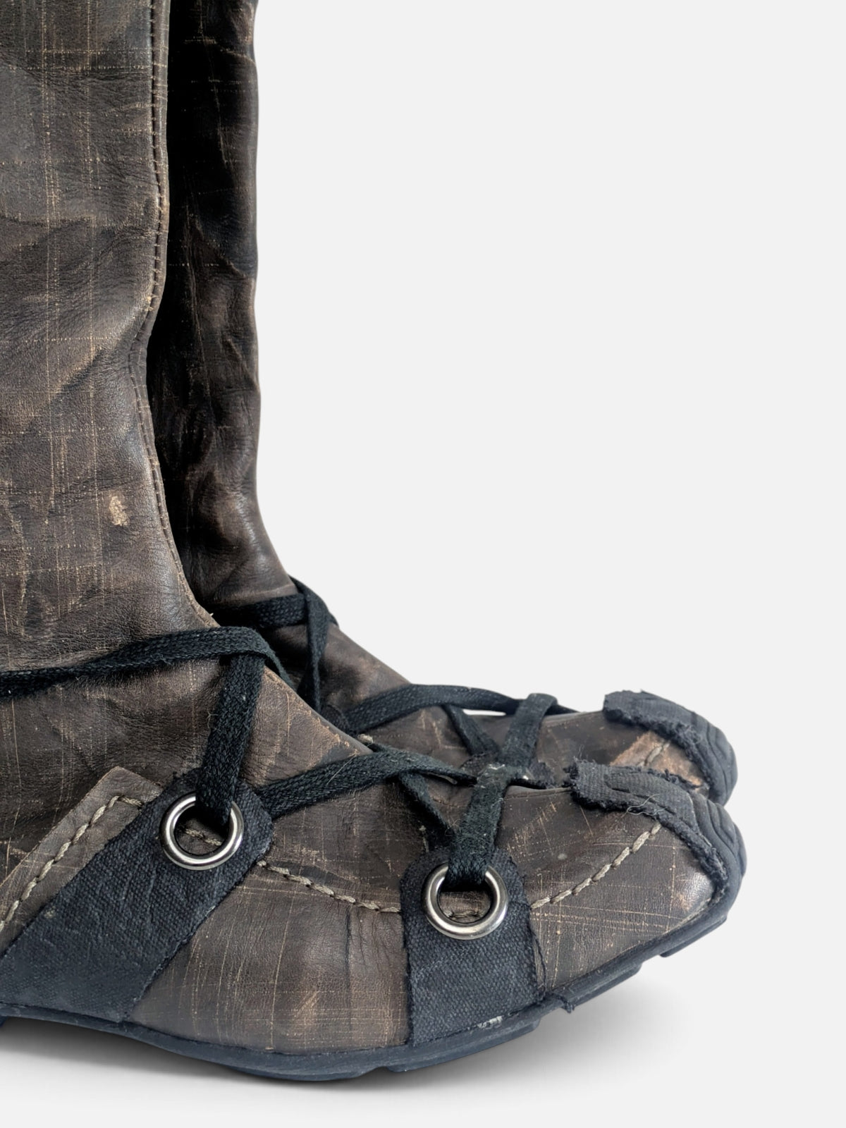 Industrial avant-garde knee-high leather boots