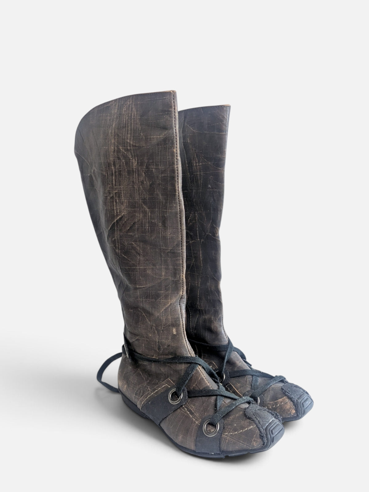 Industrial avant-garde knee-high leather boots