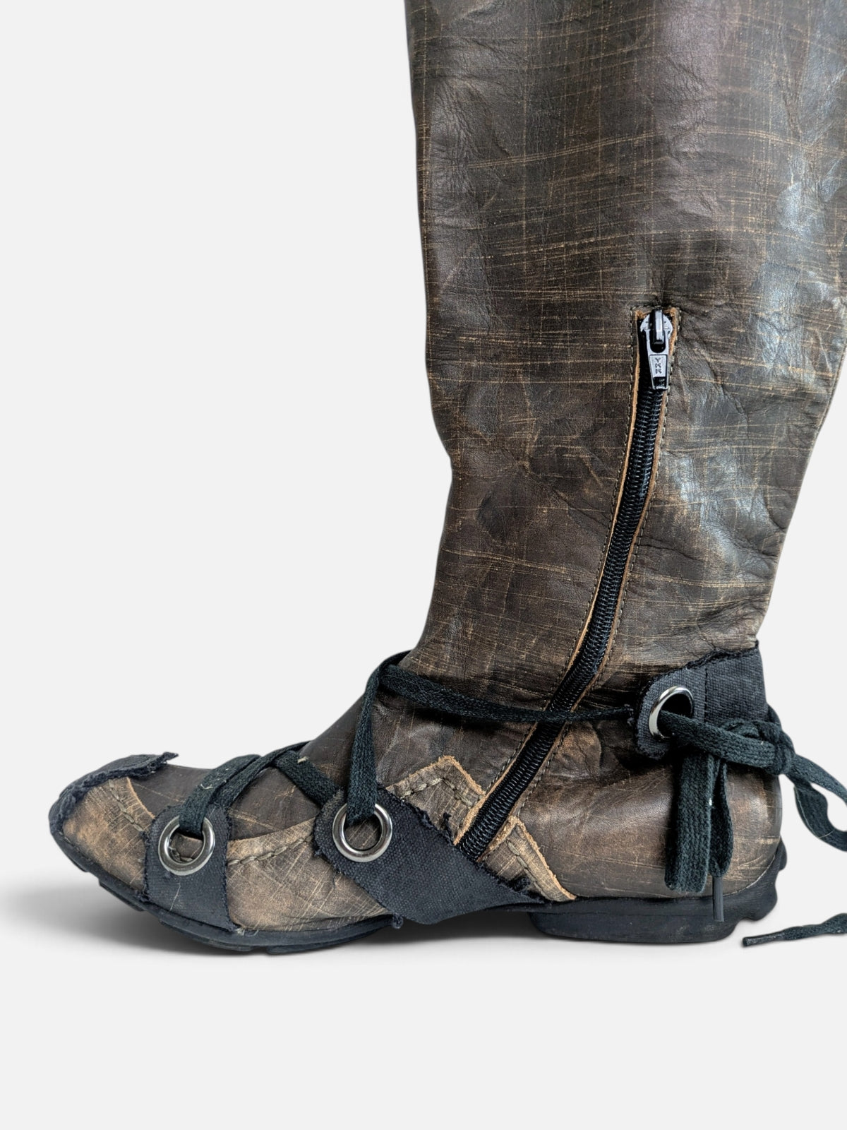 Industrial avant-garde knee-high leather boots