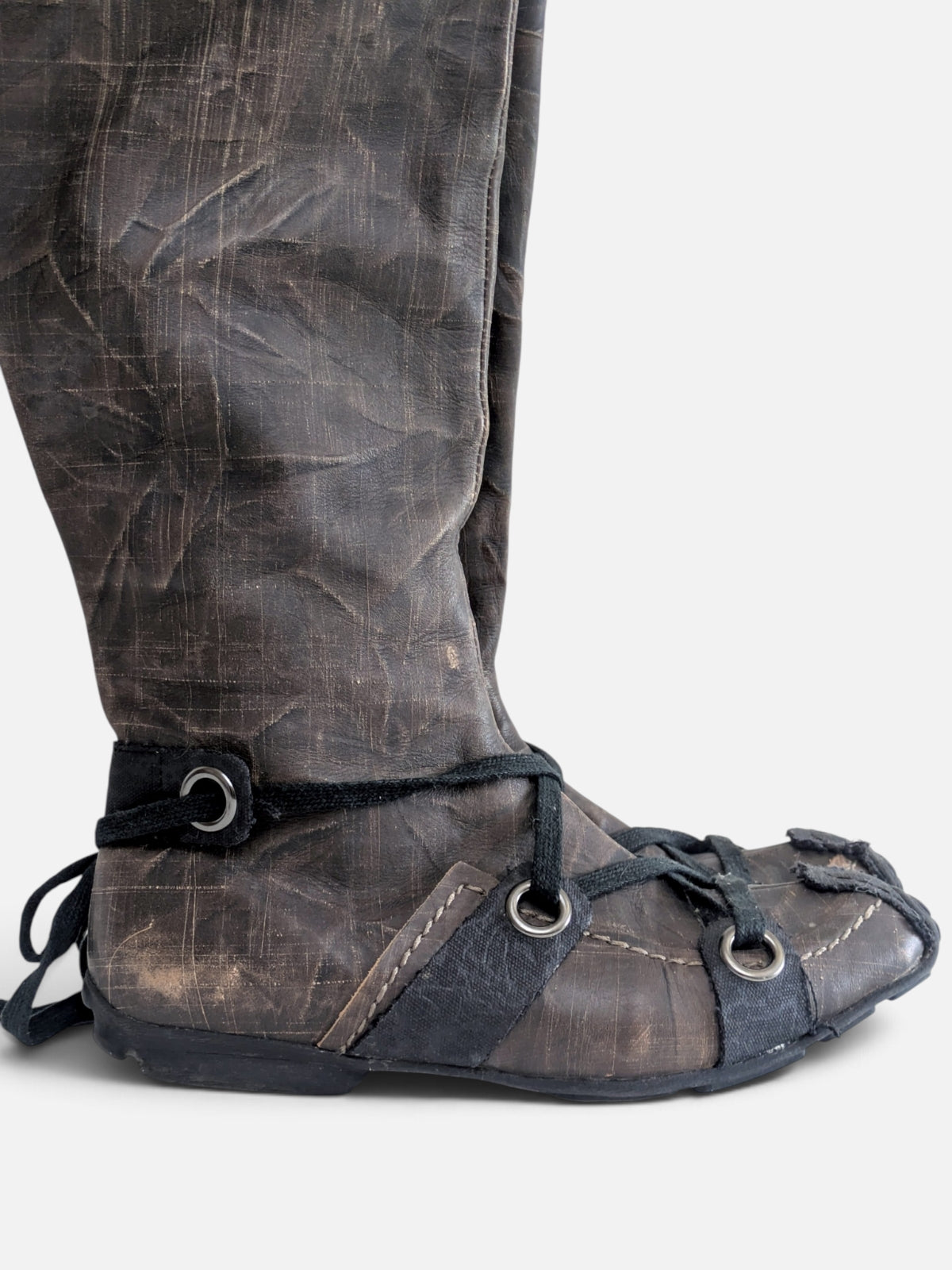 Industrial avant-garde knee-high leather boots