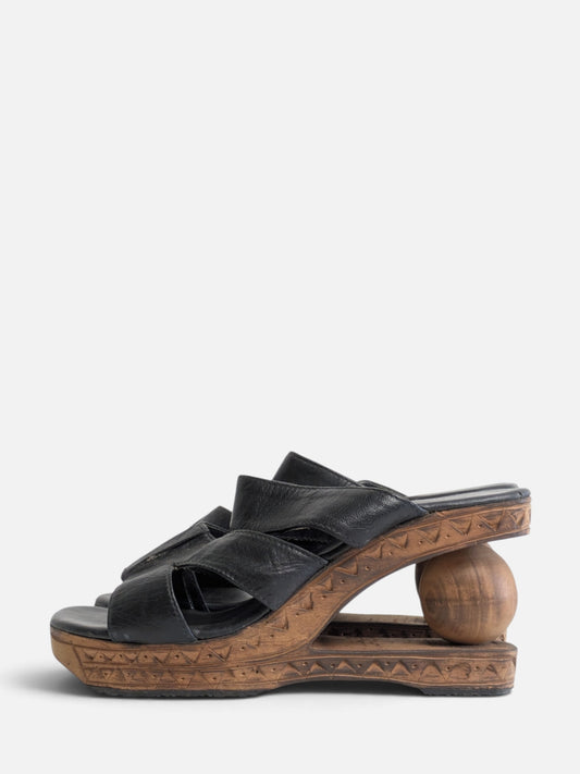 Sculptural wooden platform sandals (90s)
