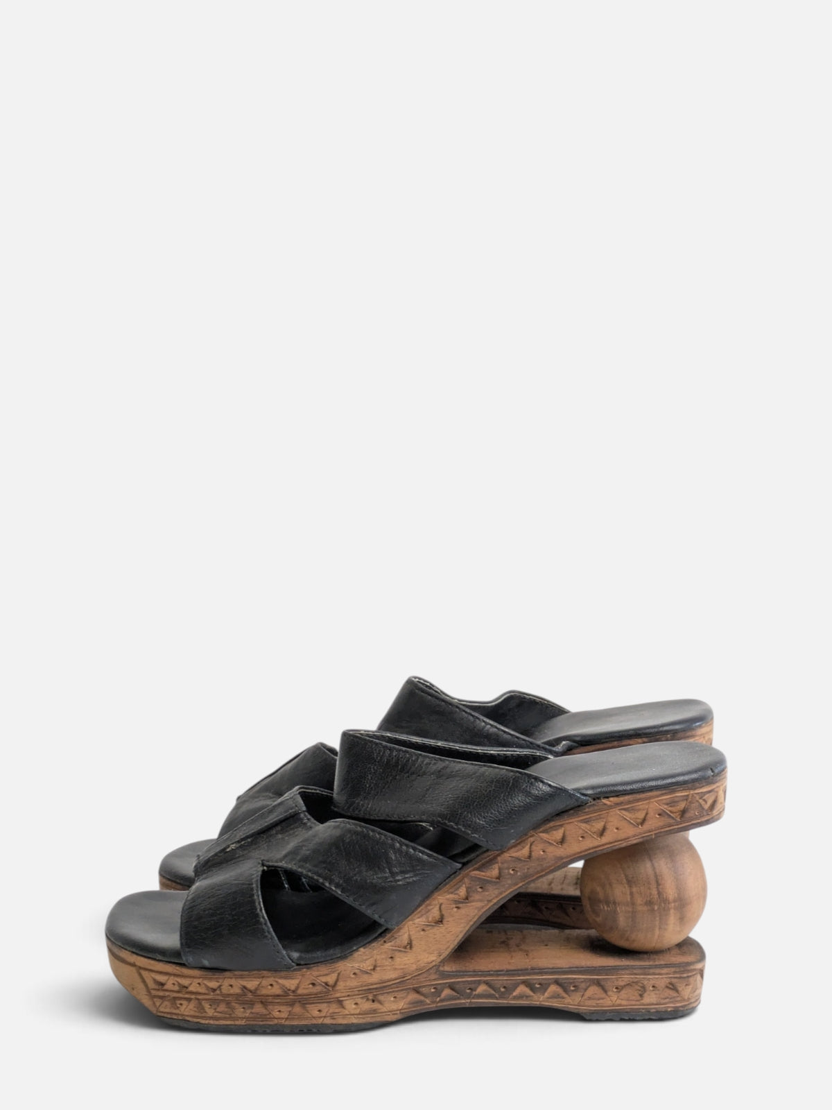 Sculptural wooden platform sandals (90s)
