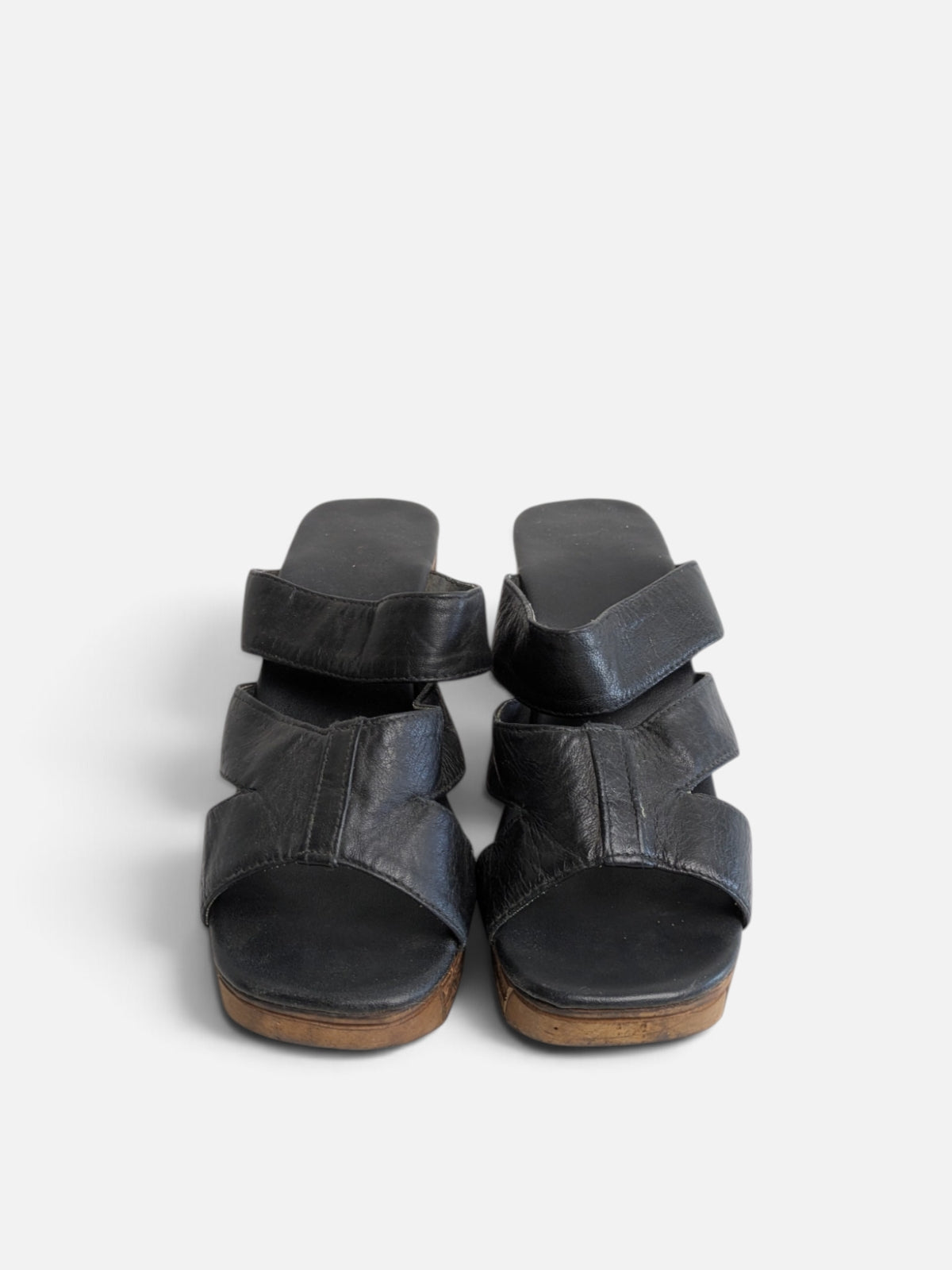 Sculptural wooden platform sandals (90s)