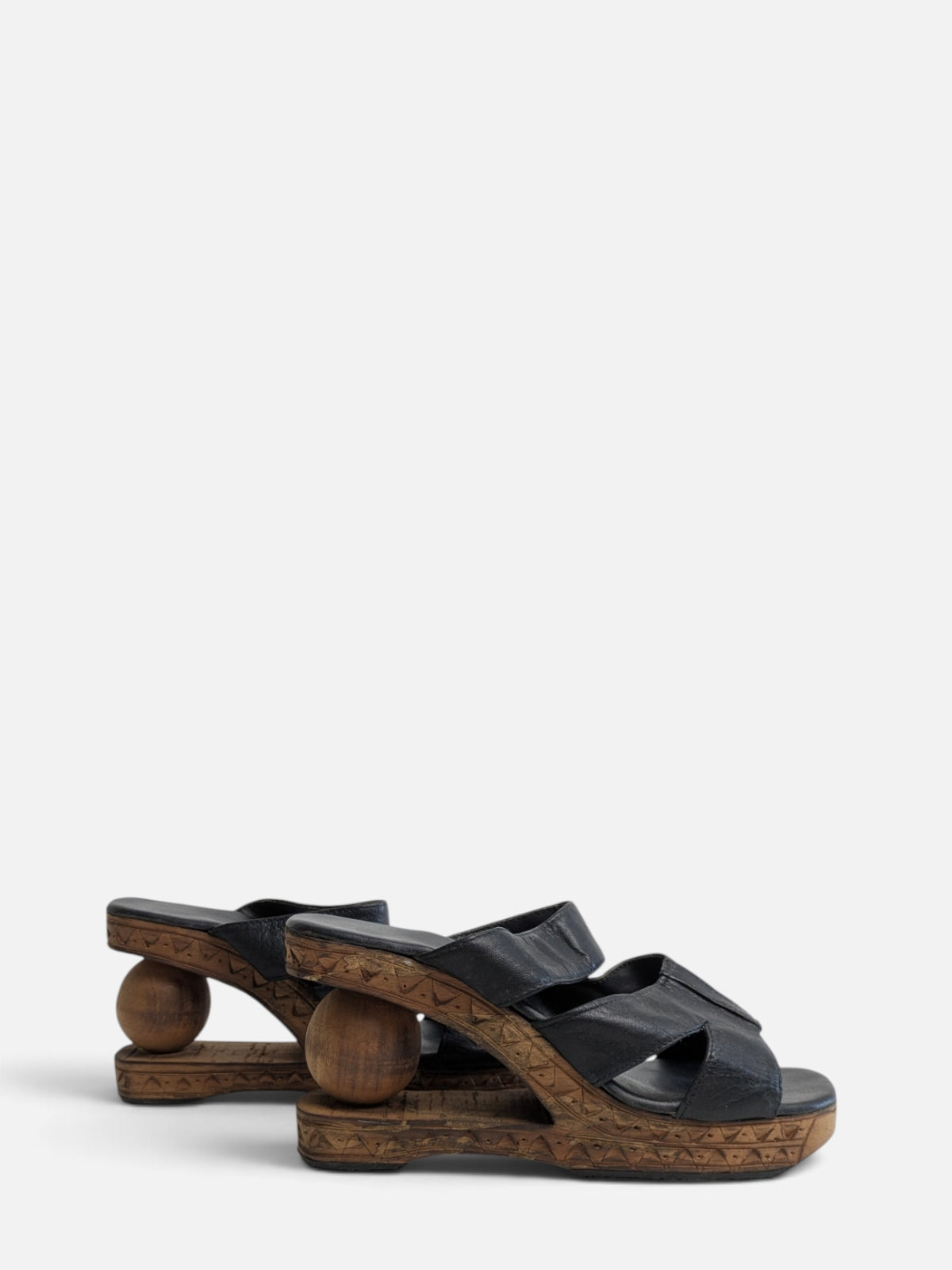Sculptural wooden platform sandals (90s)