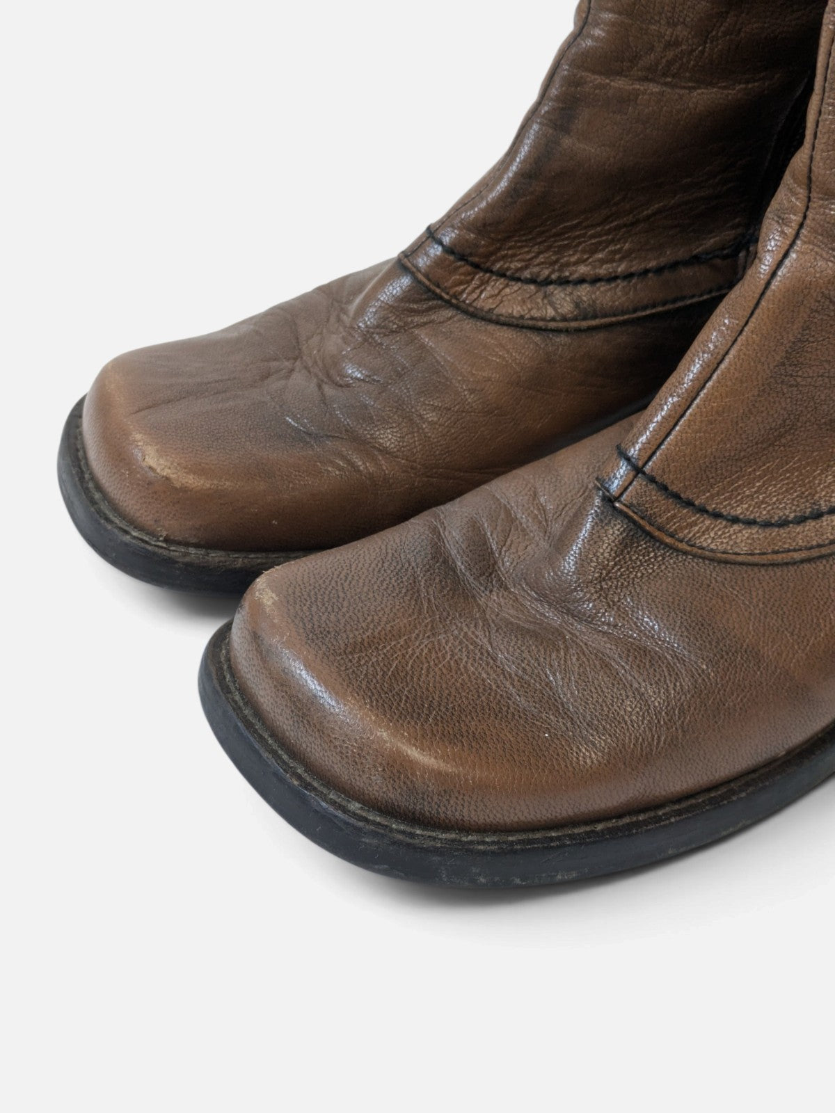 Spiral square-toe leather boots (2000s)