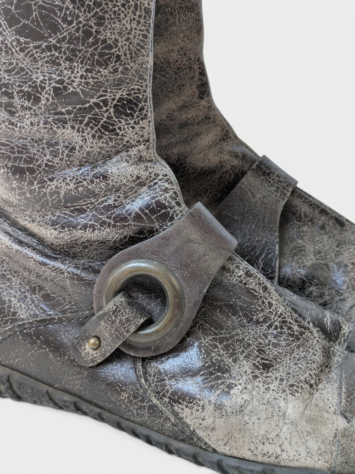 Distressed leather O-ring high boots (2000s)