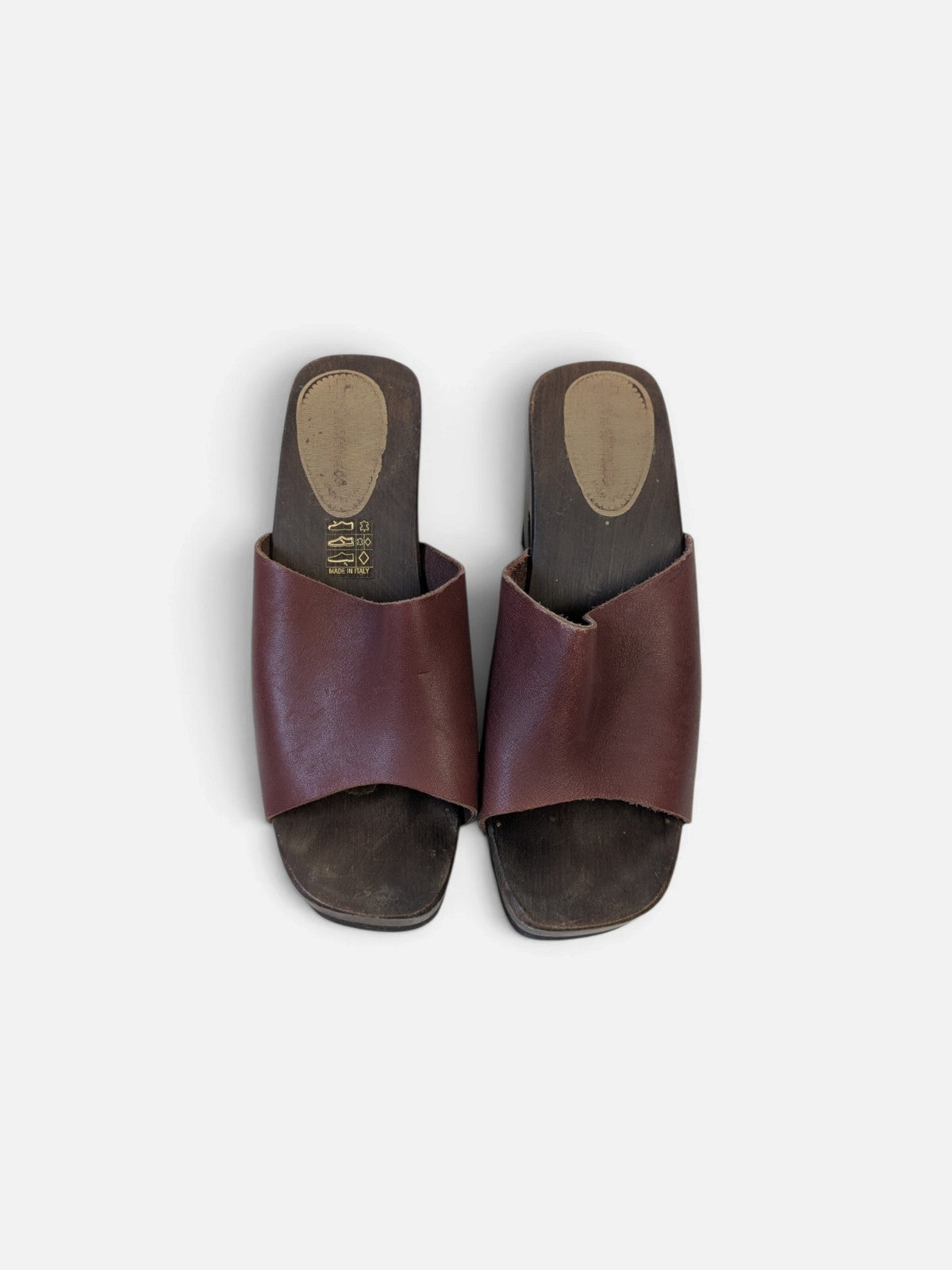 Rare sculptural wood platform sandals (90s)