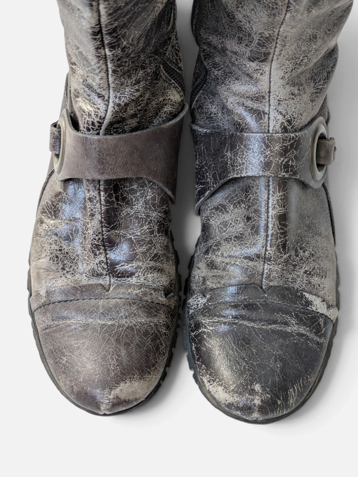 Distressed leather O-ring high boots (2000s)