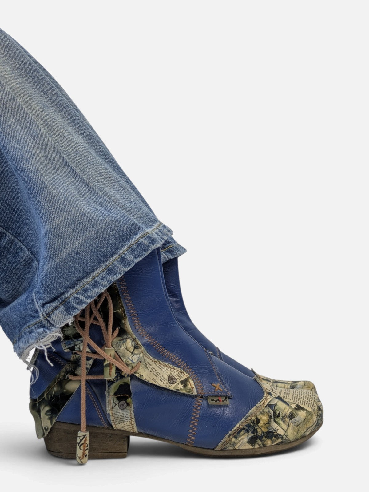 Patchwork newsprint ankle boots (2000s)